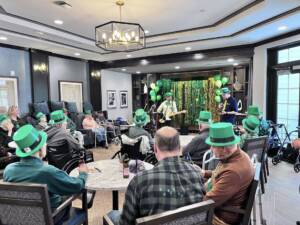 Residents and staff enjoying a live performance at The Chelsea at Washington Township Assisted Living and Memory Care community in Bergen County, NJ.