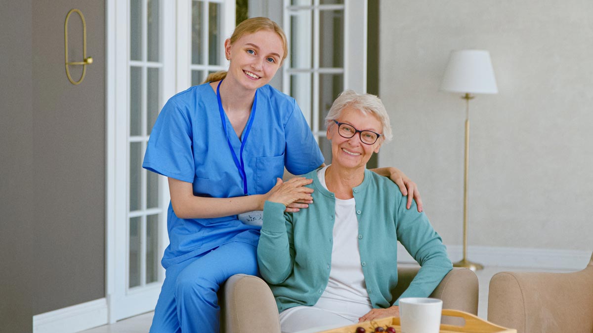 Shutterstock 2049327848 Min Nurse with senior resident enjoying coffee